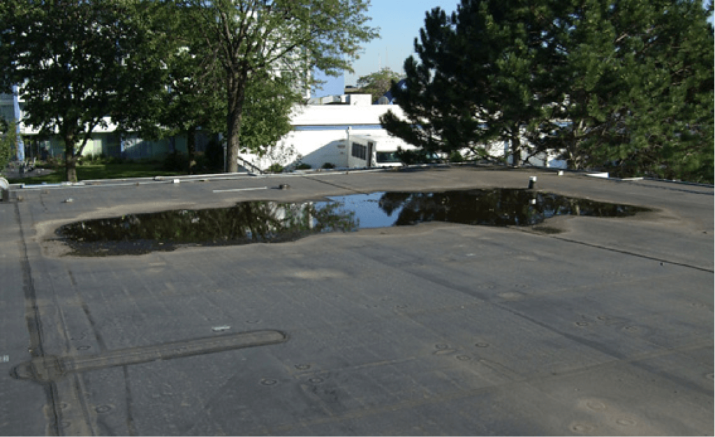 Ponding water can cause lots of damage on a commercial roof.