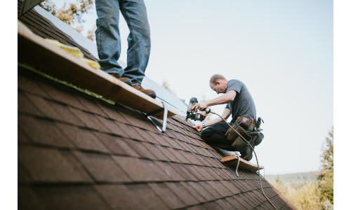 roofers making repairs