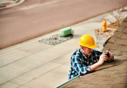 roofer doing inspection